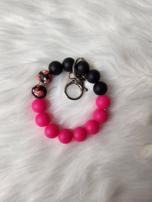 Hot pink and black wristlet